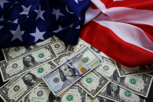 us currency - paper notes - dollars and flag-news content